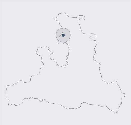 Skizze einer Region mit einem Punkt und einem Kreis im Norden.